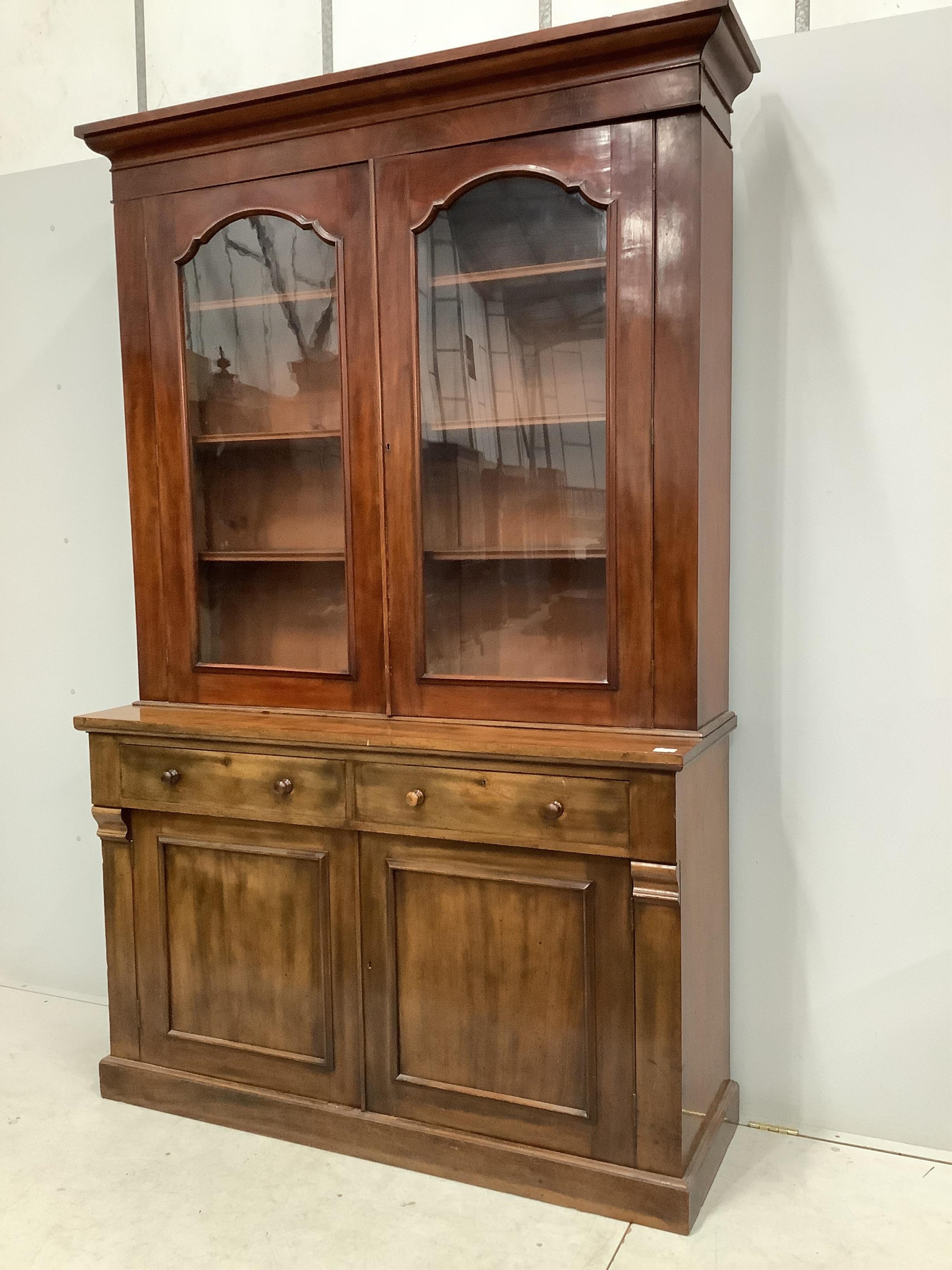 A Victorian mahogany library bookcase, width 145cm, depth 49cm, height 231cm. Condition - fair